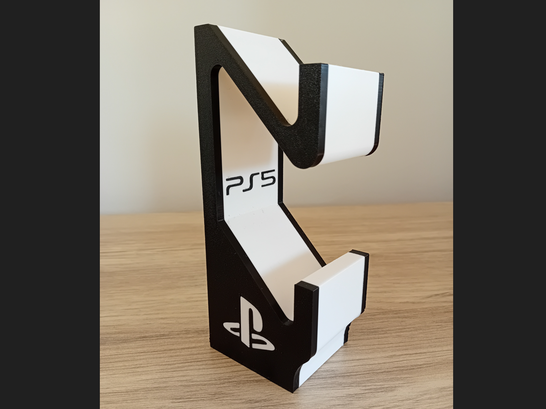 Black and white 3D-printed vertical PS5 DualSense stand with PlayStation branding